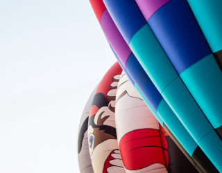 Colorful balloons sky naive art - saturated free wallpaper