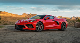 Red sports car mountain cloudy - 4k uhd image free wallpaper