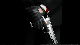 Man black suit gun red 2 - a black suit holding free wallpaper
