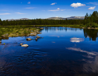 River rocks clouds trees sky - the middle of it free wallpaper