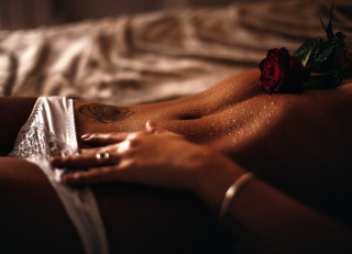 Woman rose tattoo blurry closeup - a rose free wallpaper