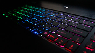 Keyboard backlit red blue dark - a close up of a keyboard free wallpaper