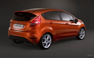 Small orange car studio rendering - a studio photo free wallpaper