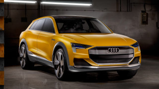 Yellow car garage black background - a yellow car free wallpaper