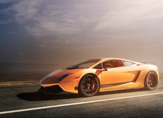 Yellow sports car cloudy sky 8 - a sunbeam in the background free wallpaper