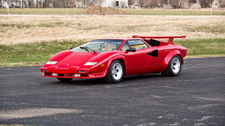 Red sports car road grass - outrun free wallpaper