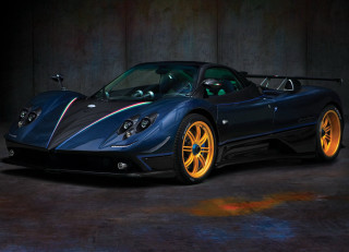 Blue sports car orange wheels - a garage area free wallpaper