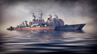 Large ship ocean sunset military - water under a cloudy sky free wallpaper