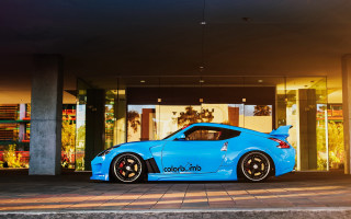 Blue sports car building window - vibrant color free wallpaper
