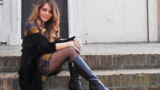 Woman sitting fur coat polka - the step of a building free wallpaper