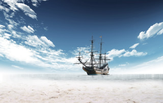 Large ship beach ocean sky - a sandy beach next free wallpaper