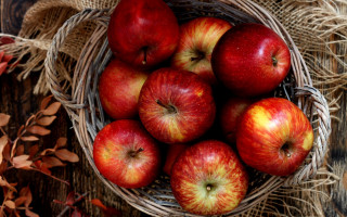 Basket apples leaves berries harvest - a basket of apples free wallpaper