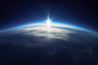 Sun earth space clouds blue - over the earth free wallpaper