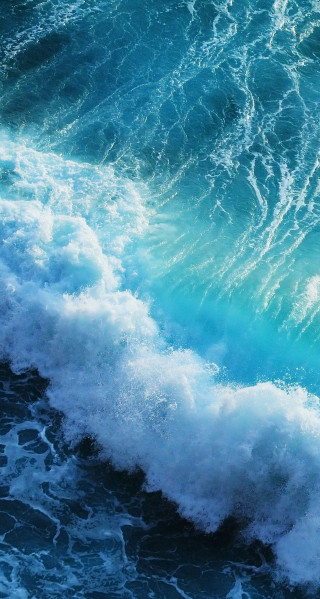Wave breaking ocean blue foamy - a wave free wallpaper for mobile