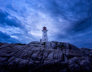 Lighthouse rocky outcrop dusk cloudy - adobe lightroom free wallpaper