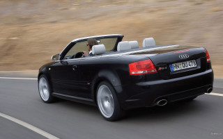Black convertible car road hillside - free motorcycles wallpaper