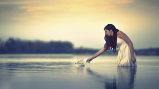 Woman white dress laptop beach - the waters edge free wallpaper