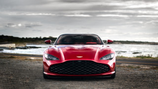 Red sports car gravel road 3 - detailed face free wallpaper