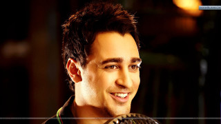 Smiling man holding fan dark - a fan free wallpaper for desktop