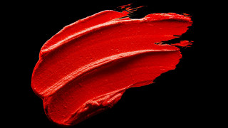 Red lipstick smudge black background - abstract brush stroke free wallpaper