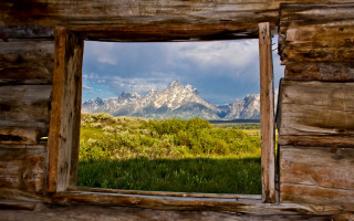 Window mountain range cabin foreground - a sky background and grass free wallpaper