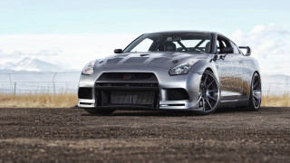 Silver sports car dirt road 4 - a silver sports car free wallpaper