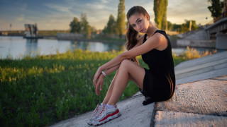 Woman sitting ledge water blue - free sports wallpaper