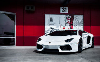 White sports car red building - a red building free wallpaper for desktop