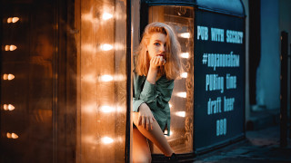 Woman window sill light sign - behind her free wallpaper