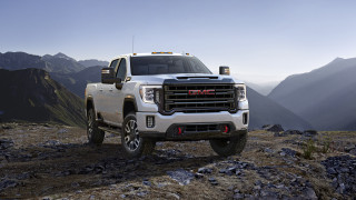 White truck mountains rocky hill - a white truck free wallpaper