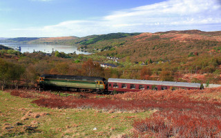 Train lake mountains green countryside - a lake in the distance free wallpaper