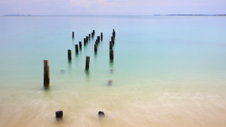 Wooden posts ocean beach sky - wooden post free wallpaper