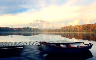 Docked boat lake trees clouds 2 - tranquil free wallpaper for desktop