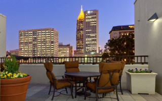 Balcony cityscape pottedplant table chairs - free architecture wallpaper