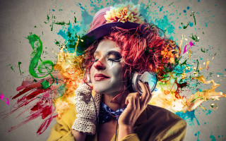 Clown makeup woman magnifying glass - her head holding free wallpaper