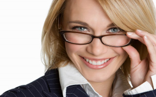 Woman glasses suit smiling adjusting - glass and a suit free wallpaper