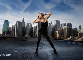 Woman black dress city skyline - claire falkenstein free wallpaper