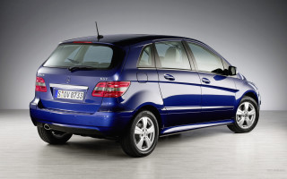 Blue car gray wall black - a gray wall free wallpaper