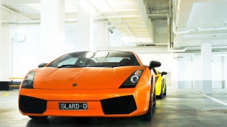 Bright orange sports car yellow - the front of it free wallpaper