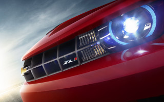 Red car bright headlight cloudy 2 - a cloudy sky behind free wallpaper