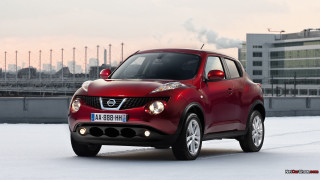 Red nissan juke snow building - free cars wallpaper