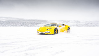 Yellow sports car snow mountains 2 - winter time free wallpaper