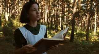 Woman holding book forest trees - in a forest free wallpaper