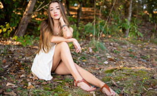 Woman forest sitting crossed legs 2 - prima free wallpaper