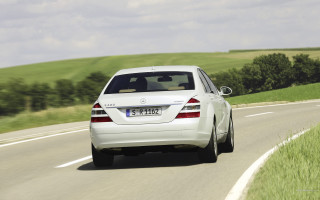 White car green field sunny - a road next free wallpaper for desktop