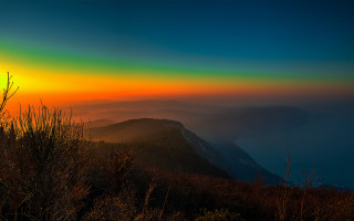 Sunset mountain green yellow sky - sky in the background free wallpaper