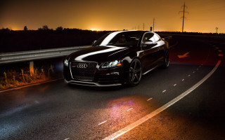 Black car highway night headlights - a highway free wallpaper