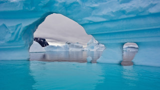 Iceberg hole water icebergs beach - large free wallpaper