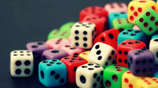 Dice pile table black background 2 - a table top free wallpaper
