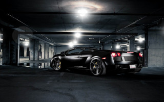 Black sports car parking garage 9 - black background free wallpaper